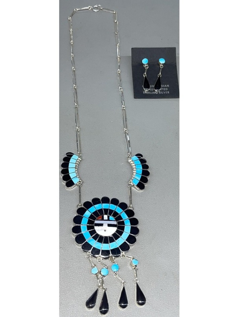 Zuni sterling silver turquoise onyx mother of pearl sunface cluster statement